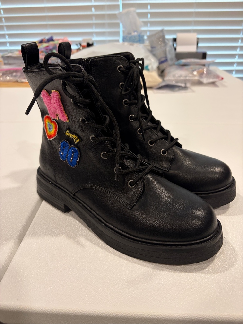 Steve Madden Black Lace-Up Kids Combat Boots with Colorful Patch Accents